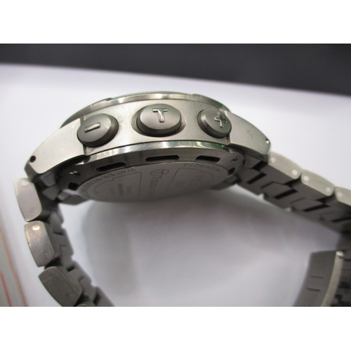 107 - A Tissot touch expert smart watch with original titanium strap, in full working order with box and i... 