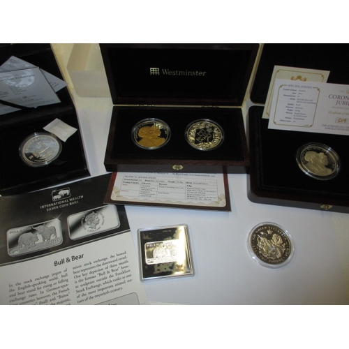 175 - A parcel of silver special edition collectors coins, to include .925 and .999, most in presentation ... 