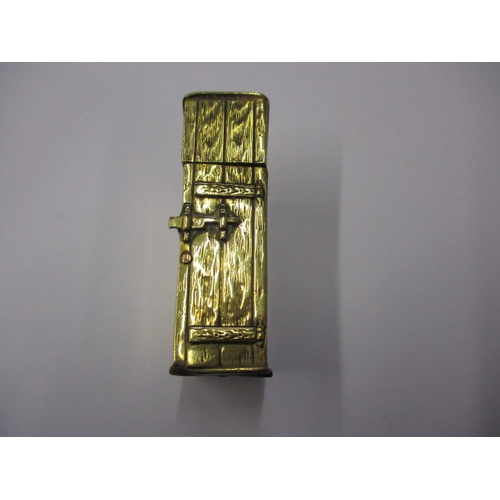 291 - An antique brass novelty vesta case, in the form of a toilet, approx. height 5cm, having general age... 