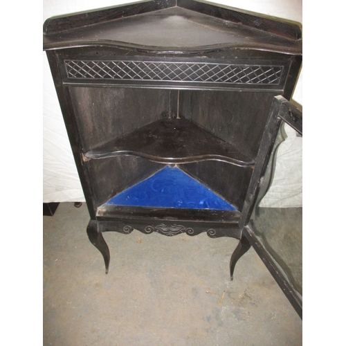 345 - A vintage ebonised floor standing glazed door corner cabinet, in good used condition, approx. height... 