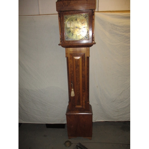 338 - An antique burr walnut longcase clock, with brass dial and striking on a bell, approx. height 194cm ... 