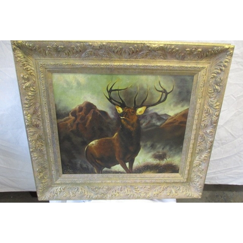 357 - A gilt framed oil on board painting of a stag, approx. frame size 85x75cm, signed lower right, in go... 