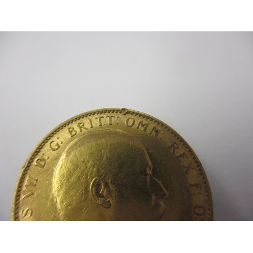 240 - An Edward VII gold sovereign dated 1910, a circulated coin with good definition of features