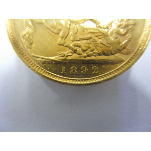 242 - A Victorian gold sovereign dated 1892, a circulated coin with fine definition of features