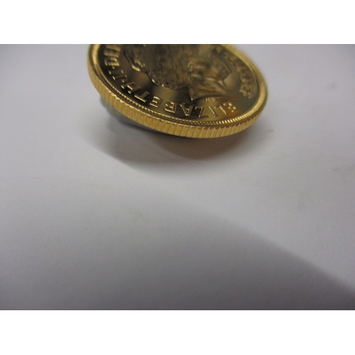 244 - An Elizabeth II gold sovereign dated 2002, an uncirculated coin