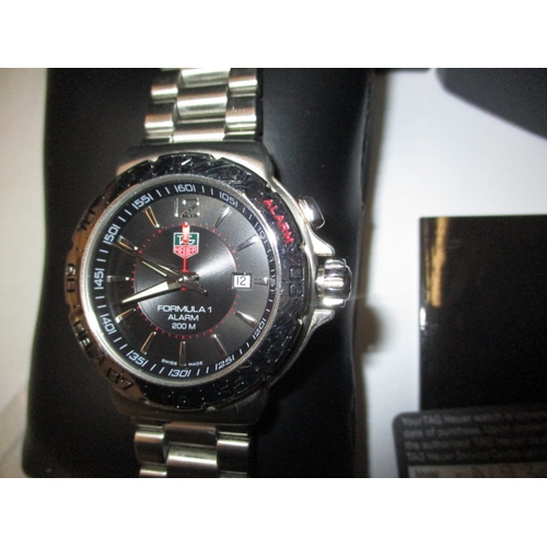 118 - A TAG Heuer Formula 1 men’s bracelet watch, with box and paperwork, and a Rotary watch, no batteries... 