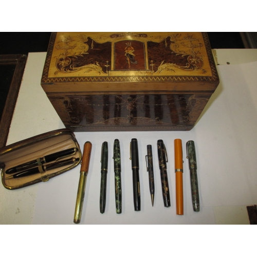 294 - A quantity of vintage fountain pens and an inlaid stationary box, to include examples by Sheaffer, P... 