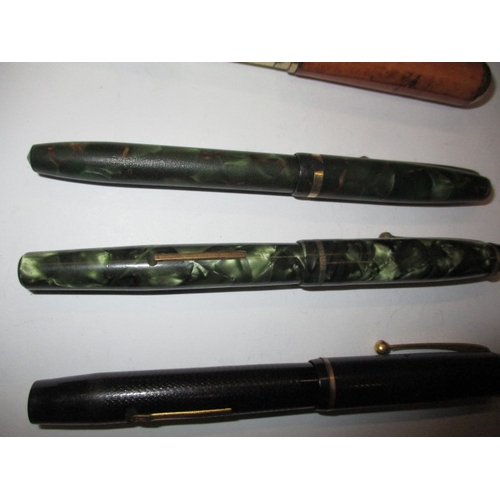 294 - A quantity of vintage fountain pens and an inlaid stationary box, to include examples by Sheaffer, P... 