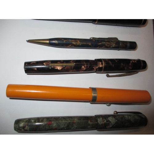 294 - A quantity of vintage fountain pens and an inlaid stationary box, to include examples by Sheaffer, P... 