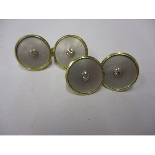 80 - A pair of 18ct yellow gold, mother of pearl and diamond cufflinks, in good pre-owned condition, appr... 