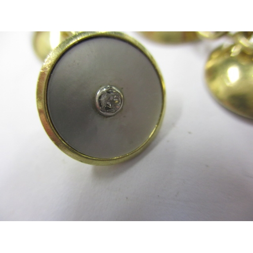 80 - A pair of 18ct yellow gold, mother of pearl and diamond cufflinks, in good pre-owned condition, appr... 