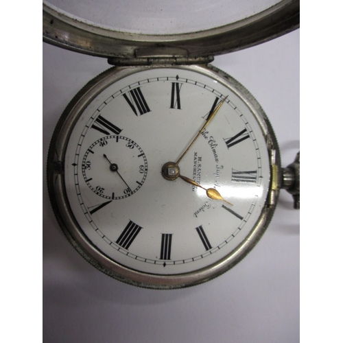 97 - A silver cased pocket watch, with silver Albert chain and vesta case, watch runs when wound, cracked... 