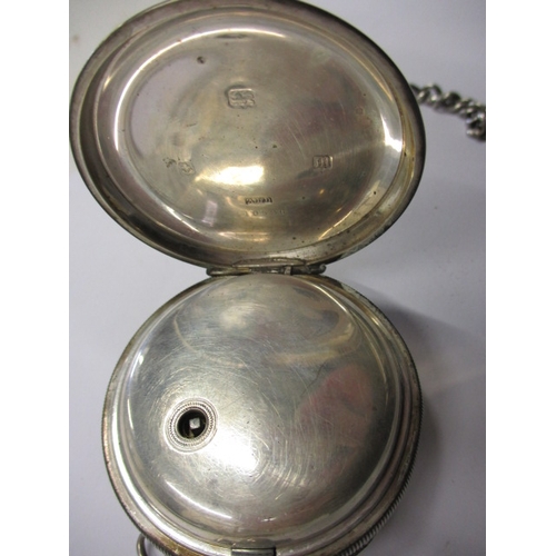 97 - A silver cased pocket watch, with silver Albert chain and vesta case, watch runs when wound, cracked... 