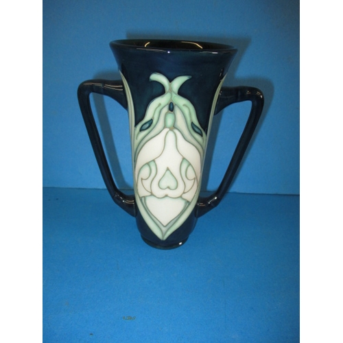 278 - A Moorcroft collectors club twin handled vase, approx. height 15cm, in good pre-owned condition with... 