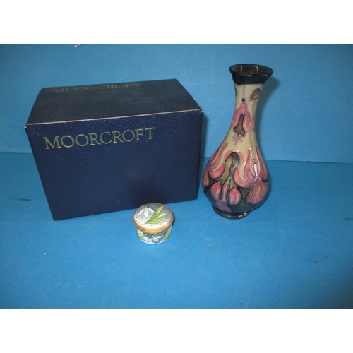 280 - A Moorcroft bud vase in the fuchsia pattern, approx. height 16.5cm and a pill box, both in pre-owned... 