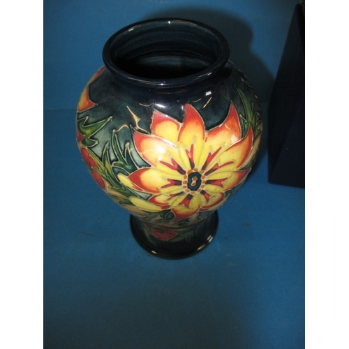 281 - A  1997 Moorcroft collectors vase in the spike pattern, approx. height 16cm in good pre-owned condit... 