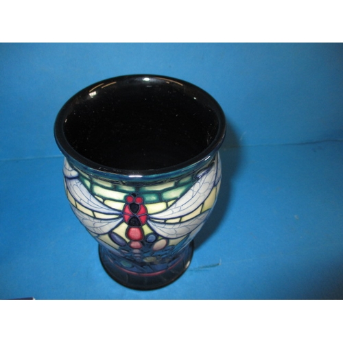 282 - A Moorcroft pottery vase in the favrile design, approx. height 13.5cm in good pre-owned condition wi... 