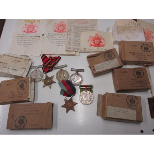 307 - Small parcel of original WW2 British military medals, empty boxes of issue and entitlement slips, al... 