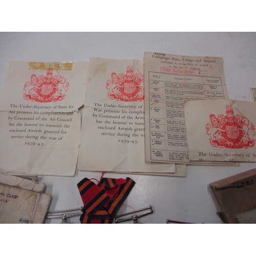 307 - Small parcel of original WW2 British military medals, empty boxes of issue and entitlement slips, al... 