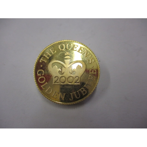 246 - A 9ct gold commemorative coin for the Queens golden jubilee dated 2002, approx. weight 7g in uncircu... 