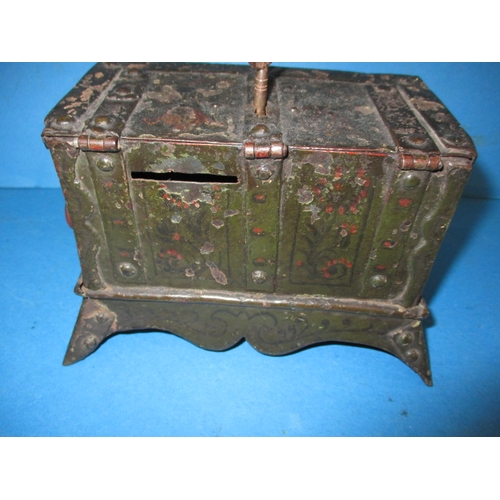 267 - A small armada style money box, with working lock, approx. size W, 17cm H, 12cm D, 10cm, having gene... 