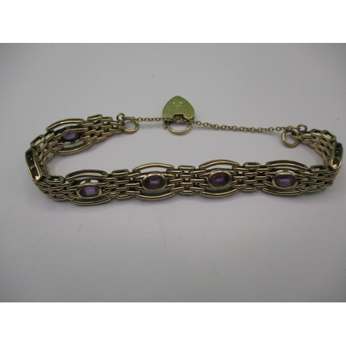 81 - A 9ct yellow gold bracelet, with central band of amethyst , approx. gross weight 24.5g, in useable p... 