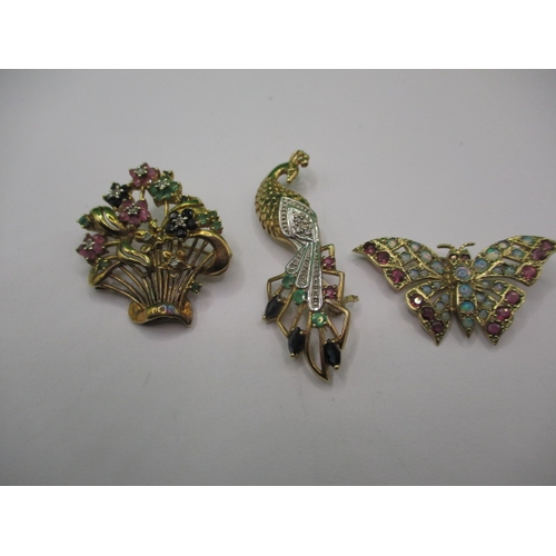 89 - Three vintage costume jewellery brooches, 2 marked for 9ct gold the other unmarked but believed to b... 