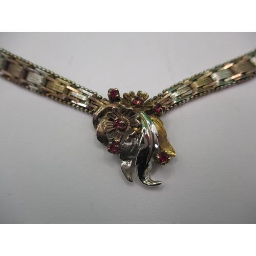 132 - A vintage costume jewellery choker style necklace, being bi-colour metal, with working clasp