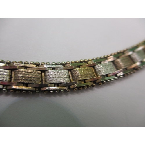 132 - A vintage costume jewellery choker style necklace, being bi-colour metal, with working clasp