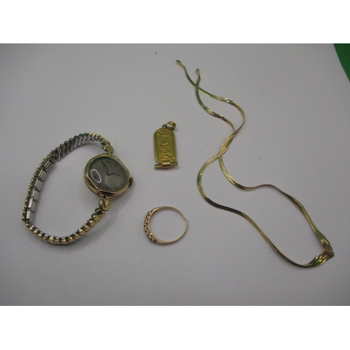 83 - A parcel of gold jewellery items, to include an Egyptian pendant and a watch, some damages