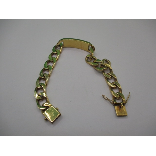 84 - An 18ct yellow gold identity bracelet, inscription obscured, so classed as damaged, approx. length 2... 