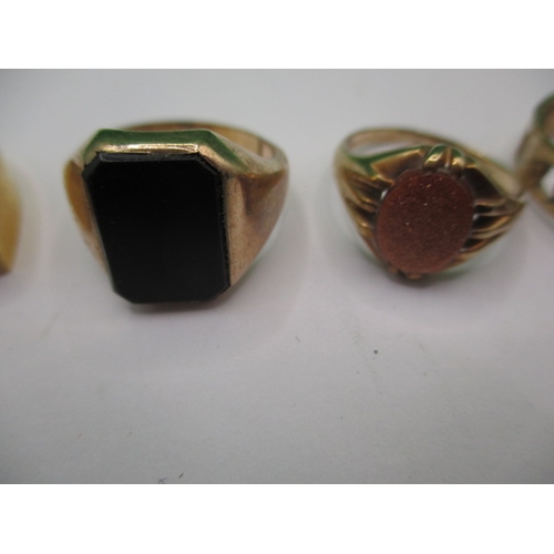 41 - A parcel of gold and yellow metal rings, 4 marked for 9ct, 1 unmarked, all in used condition, approx... 