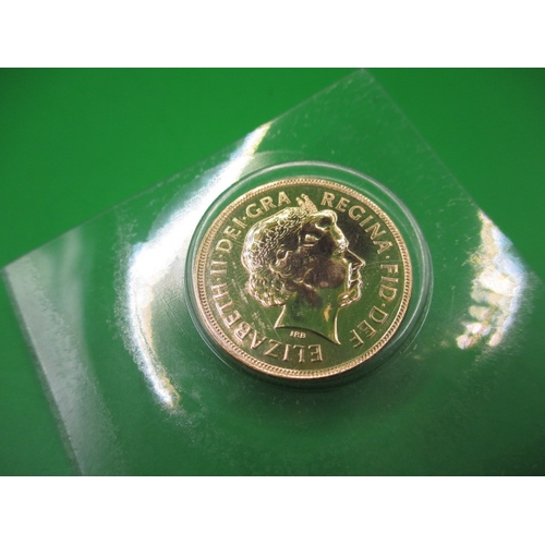 249 - An uncirculated gold sovereign, dated 2004 in Royal Mint vacuum sealed package