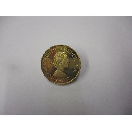 250 - A 2002 commemorative gold coin, approx. weight 7g in uncirculated condition