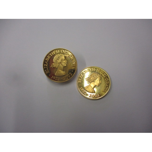 251 - Two 2002 commemorative gold coins, each approx. weight 4g in uncirculated condition