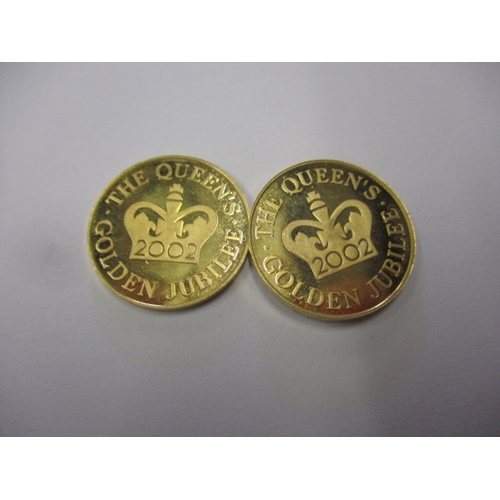 251 - Two 2002 commemorative gold coins, each approx. weight 4g in uncirculated condition