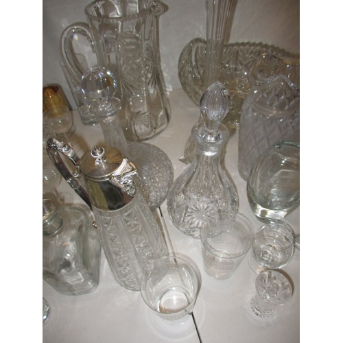 4 - A parcel of vintage mainly drinks related class items, to include decanters and a claret jug ,all in... 