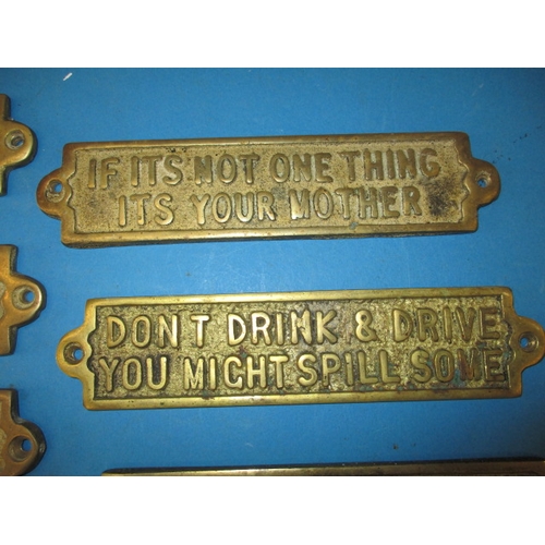 12 - A quantity of humorous cast brass door signs, approx. length of longest 25cm, all in good pre-owned ... 