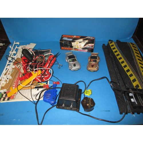 14 - A parcel of Scalextric model racing car items, to include cars, track and accessories, all in used c... 