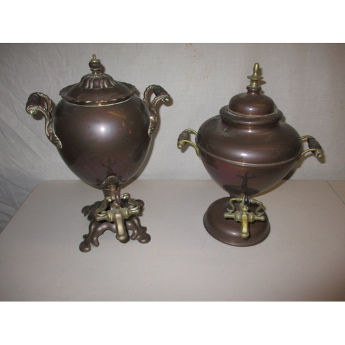 20 - Two vintage hot water urns, well tarnished with general use-related marks