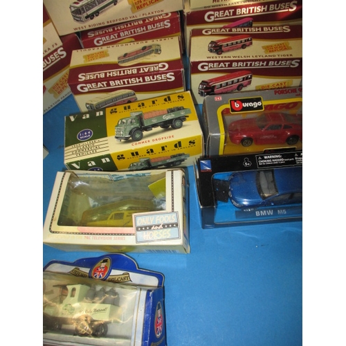 27 - A quantity of boxed collectors die-cast model vehicles, in unused pre-owned condition