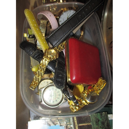 31 - A quantity of general clearance items, to include watches and a clock, all in used condition