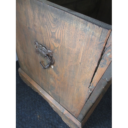 35 - A large vintage storage trunk, mixed wood, side handles broken and with general use-related marks, a... 