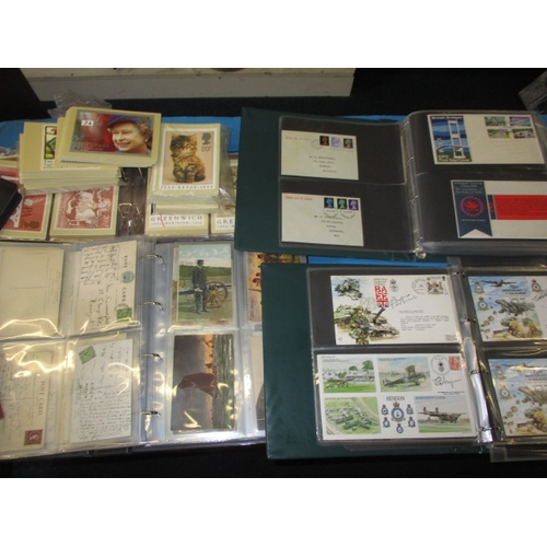 42 - A large quantity of vintage postcards and first day cover stamps, all in used condition