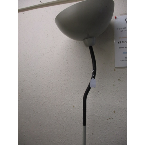 49 - A vintage Terrys angle poise lamp and an adjustable head floor standing lamp, both in used pre-owned... 