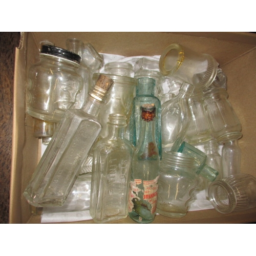 51 - A quantity of vintage glass and stoneware bottles, to include examples from Foxearth, Norwich and Bu... 