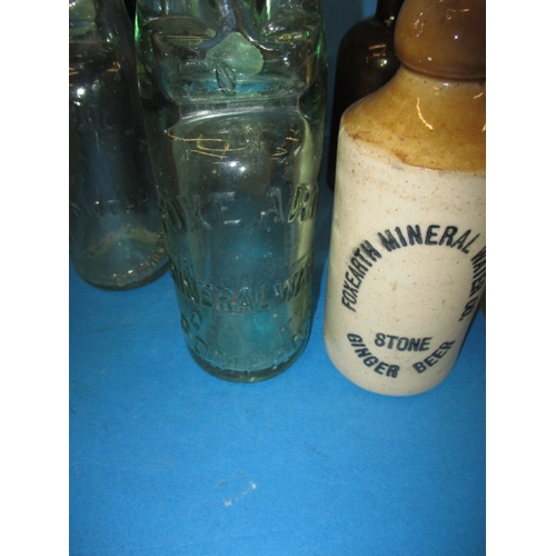 51 - A quantity of vintage glass and stoneware bottles, to include examples from Foxearth, Norwich and Bu... 