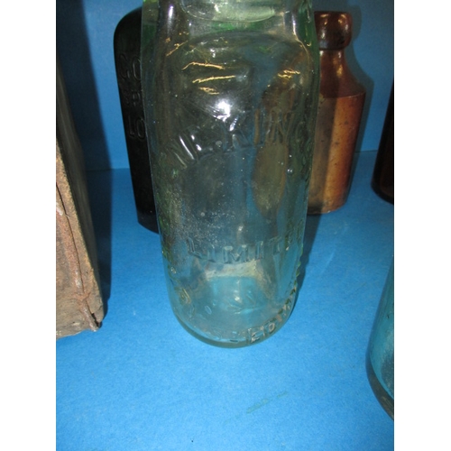 51 - A quantity of vintage glass and stoneware bottles, to include examples from Foxearth, Norwich and Bu... 