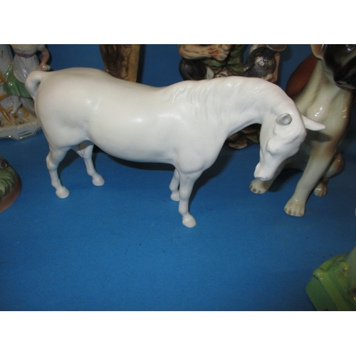 52 - A quantity of mixed ceramic items, to include a Beswick horse, all in pre-owned condition, some with... 