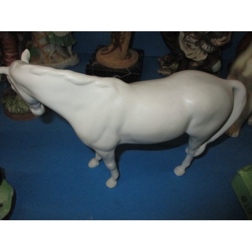 52 - A quantity of mixed ceramic items, to include a Beswick horse, all in pre-owned condition, some with... 